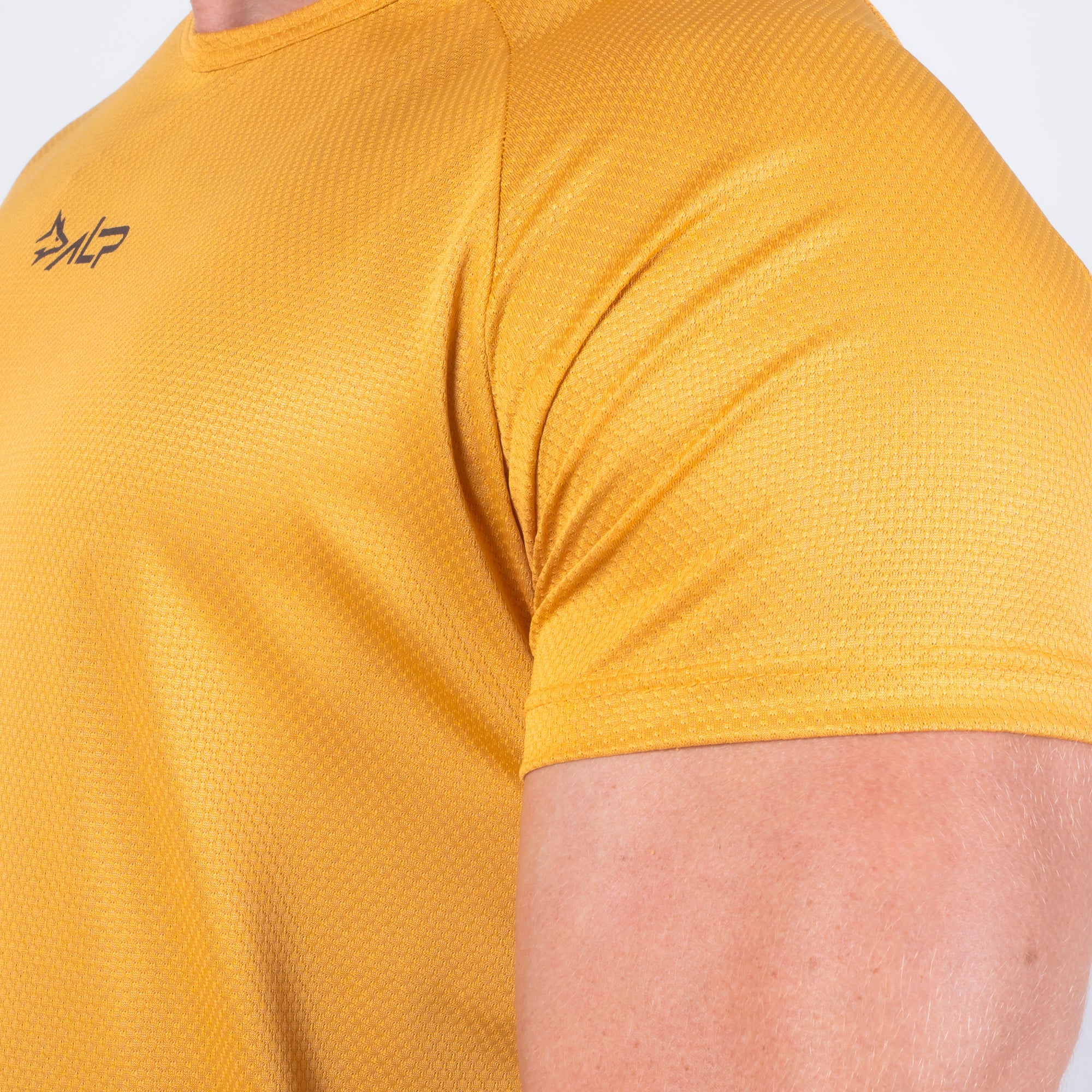 Camiseta Dry Fit New Tenacity Açafrão