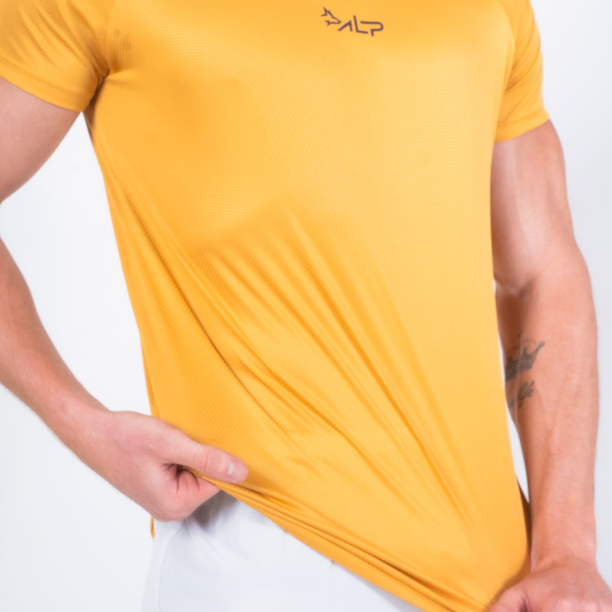 Camiseta Dry Fit New Tenacity Açafrão