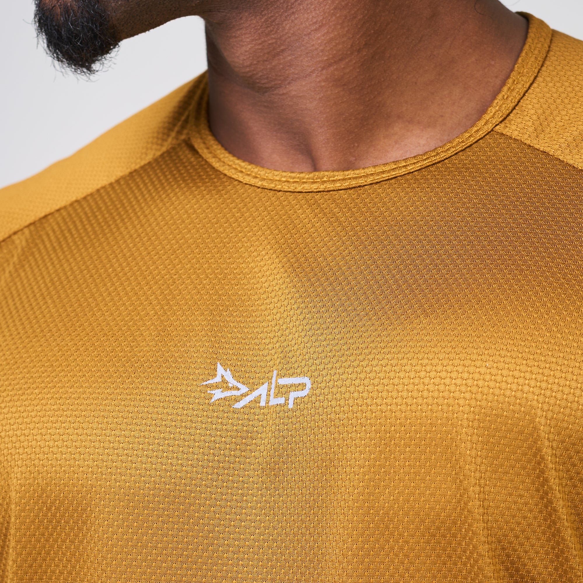 Camiseta Dry Fit New Tenacity Ocre